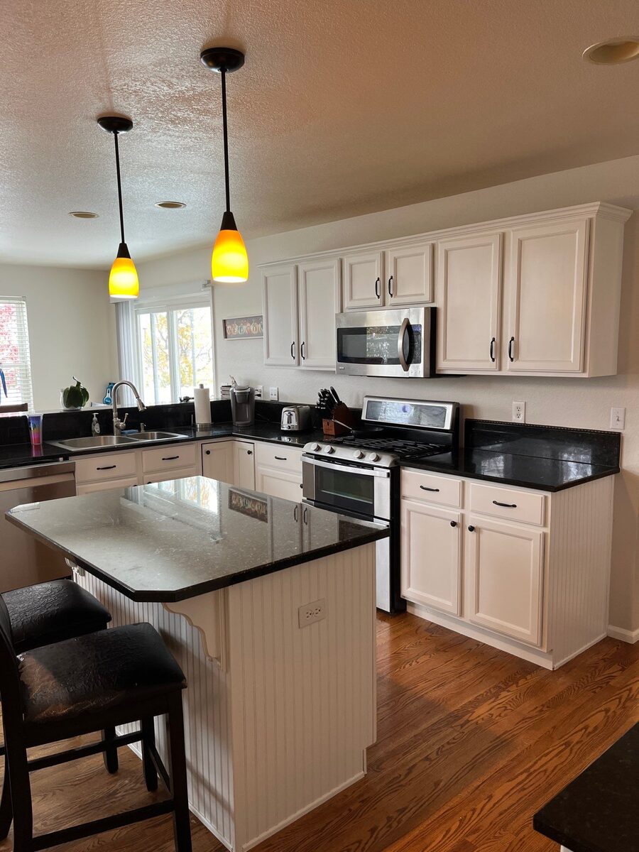 Denver kitchen cabinets after repainting by Kind Home Painting